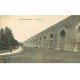 carte postale ancienne 78 LOUVECIENNES. Aqueduc et elégante