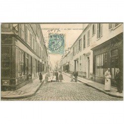 carte postale ancienne 94 CHOISY LE ROI. La rue Saint Louis 1905 Boucher devant l'Horlogerie Bijouterie